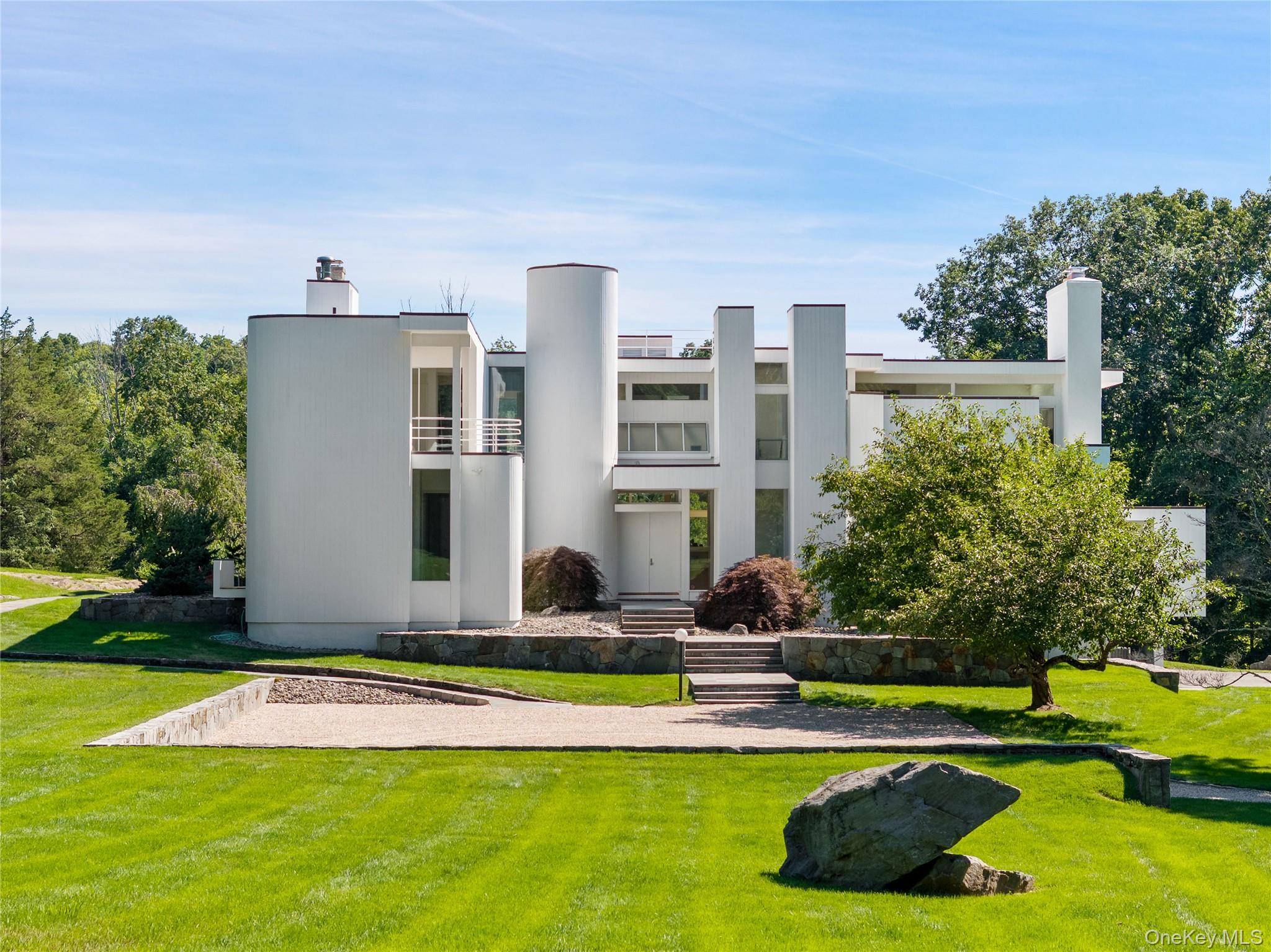 Designed by Vuko Tashkovich, one of Westchester's defining modernist a...