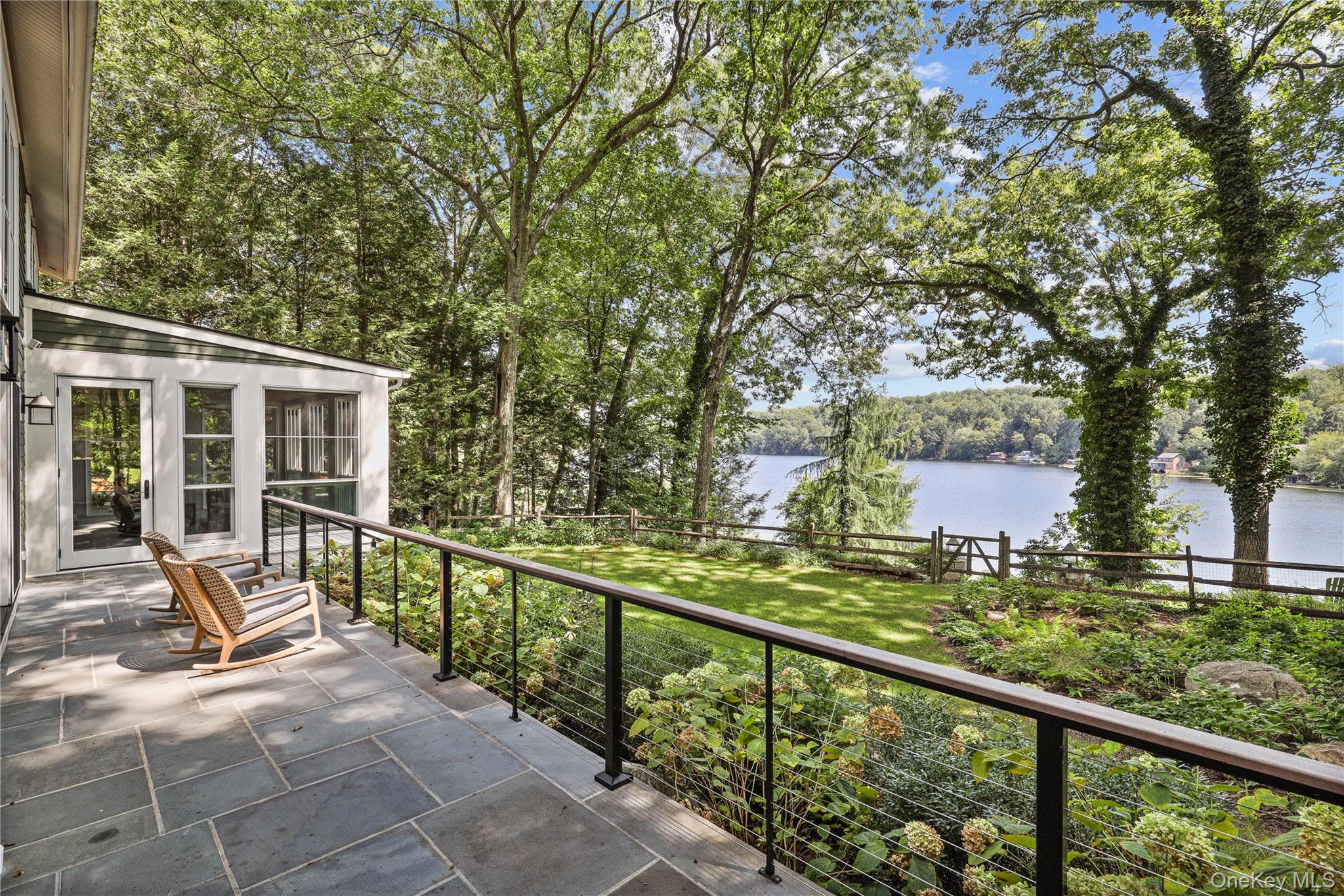 Direct waterfront on Lake Oscaleta!  This completely reimagined 4-bedr...