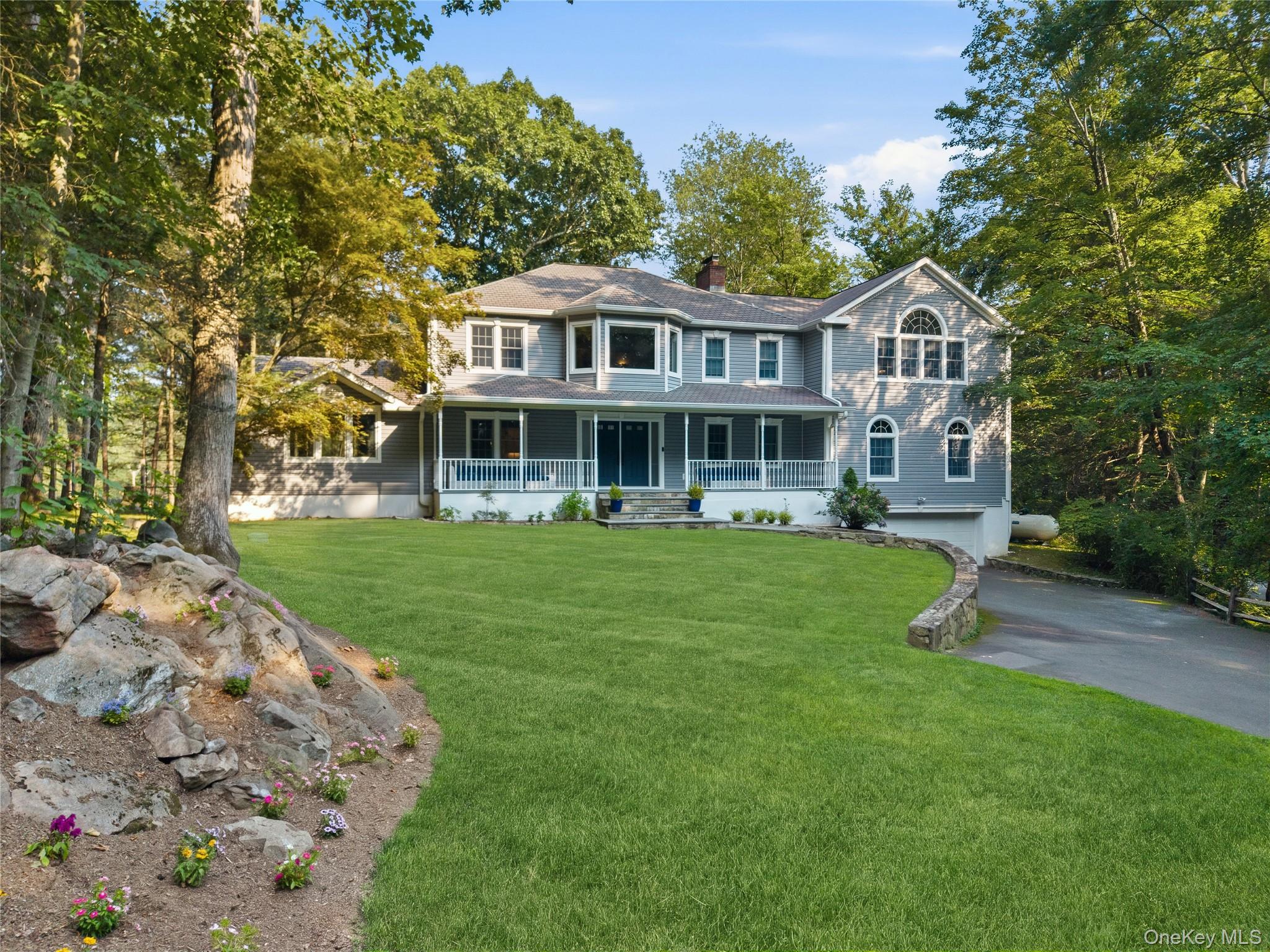 Lakefront living at its best in Pound Ridge!  This spacious 4 bedroom...