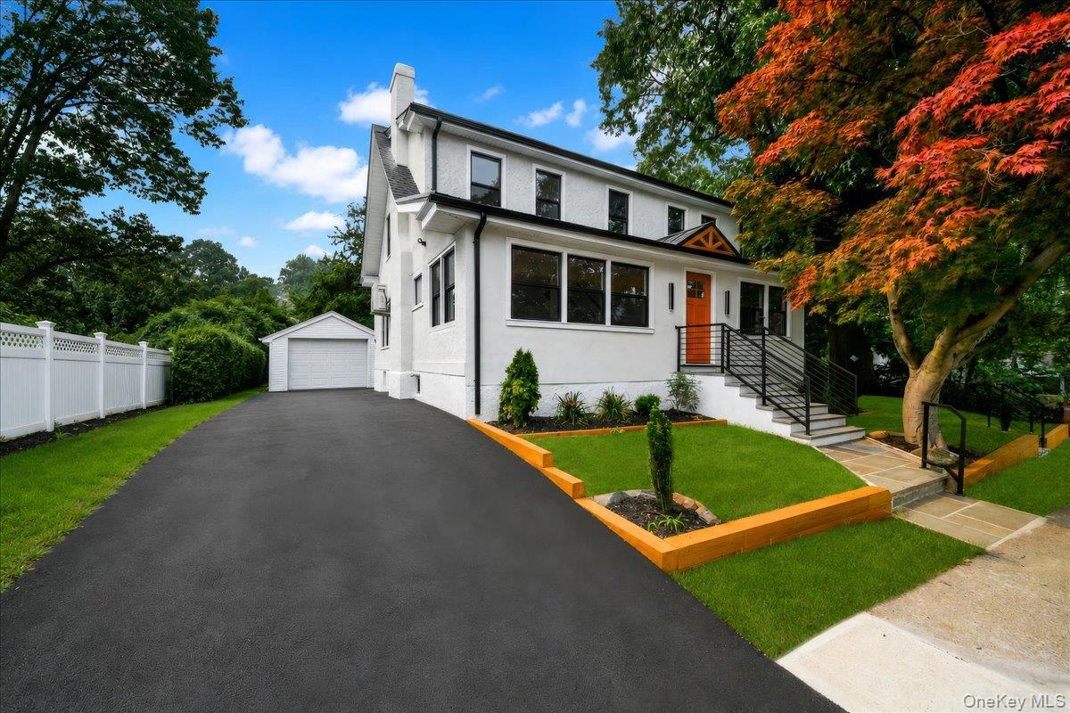Welcome to 81 Ridge Road, Yonkers, NY—a beautifully renovated stucco h...