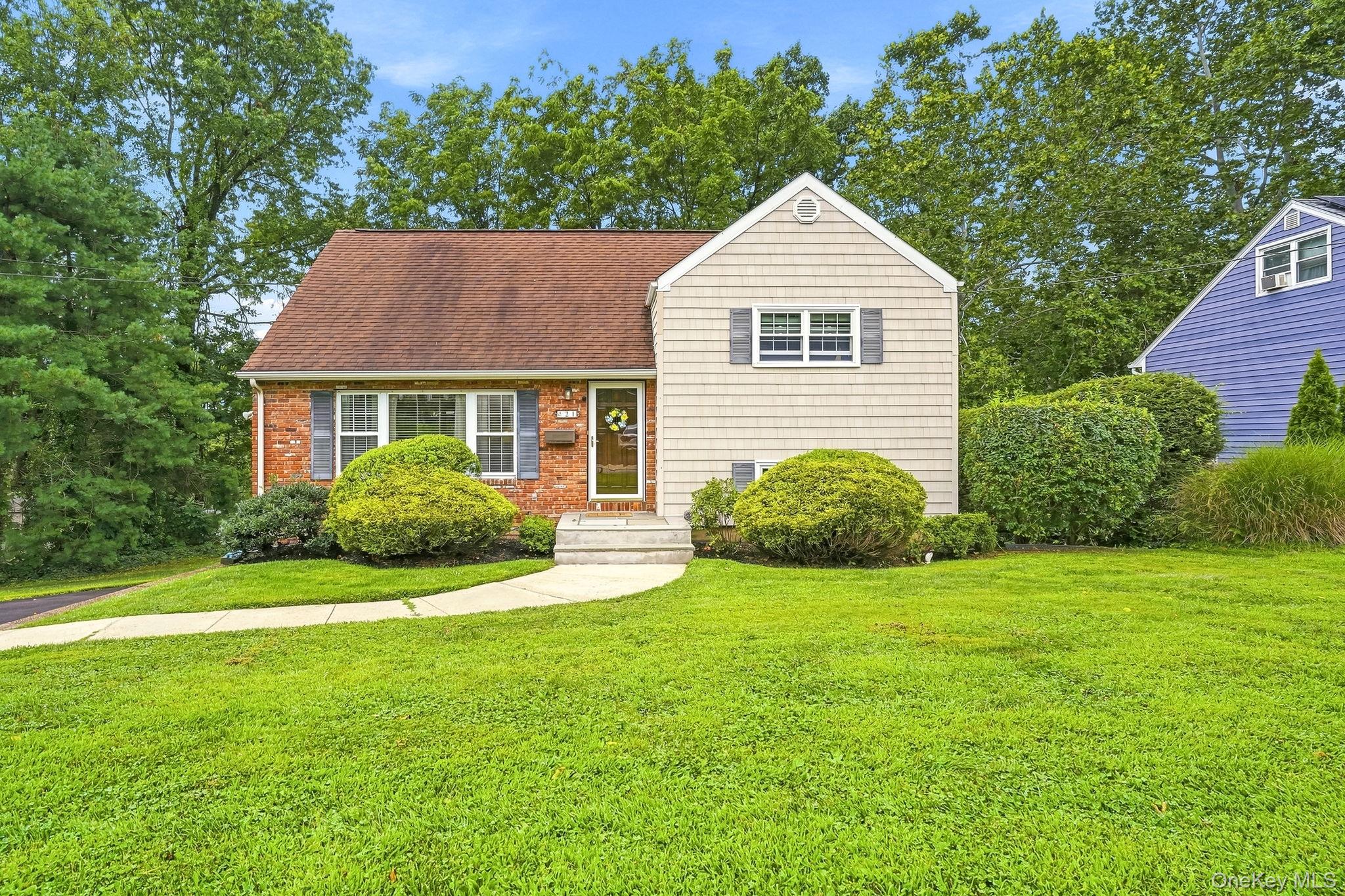 Welcome to this beautifully maintained split-level home in the highly...