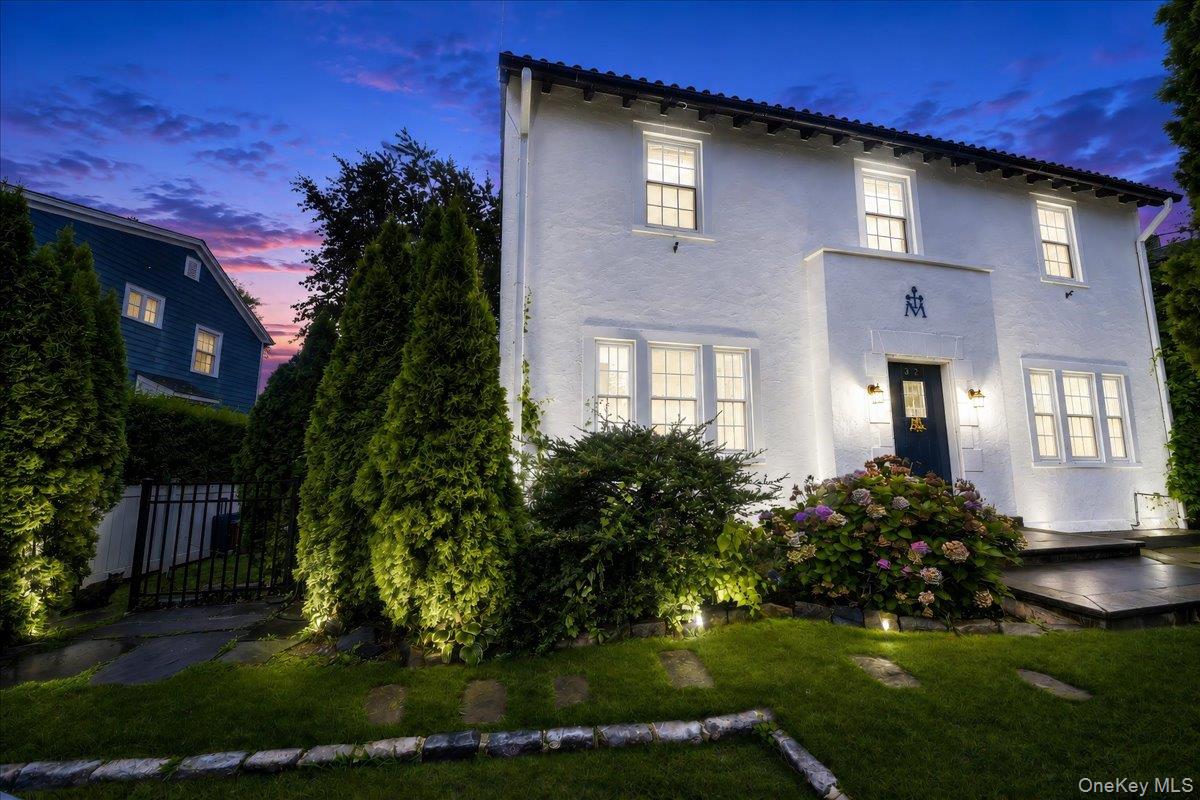 Welcome to this beautifully appointed Tudor-style home in the desirabl...