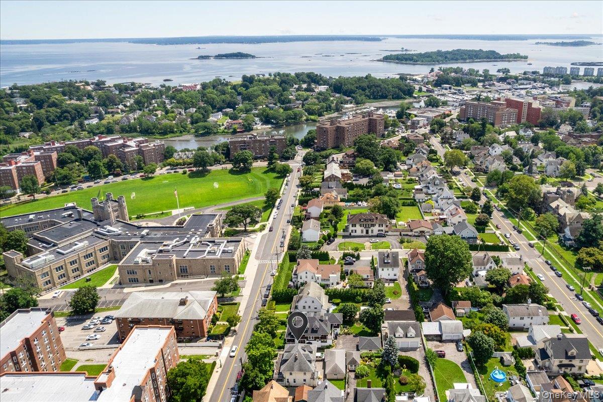A Three-family home in New Rochelle with flexible living space and a s...