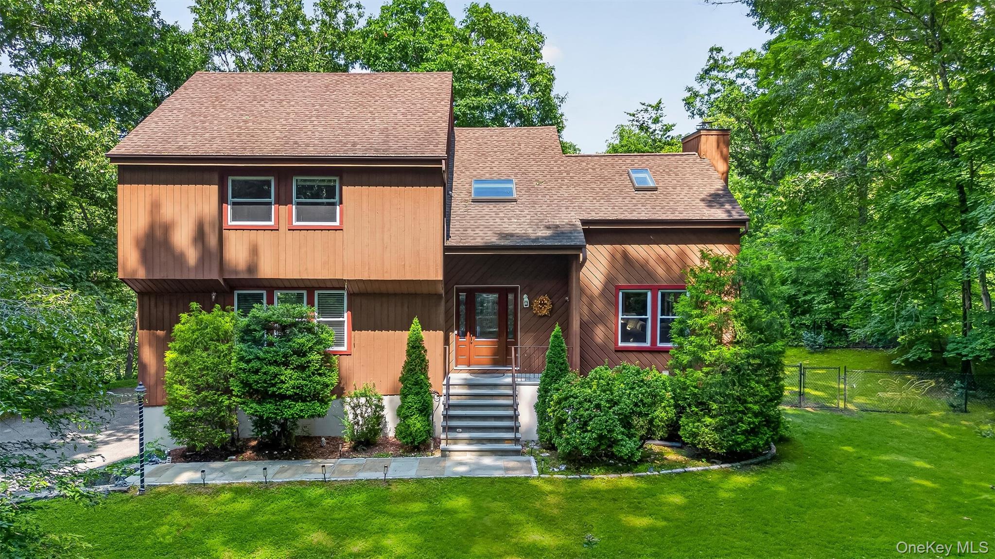 Tranquility awaits in this stunning, sun-filled Modern Colonial, priva...