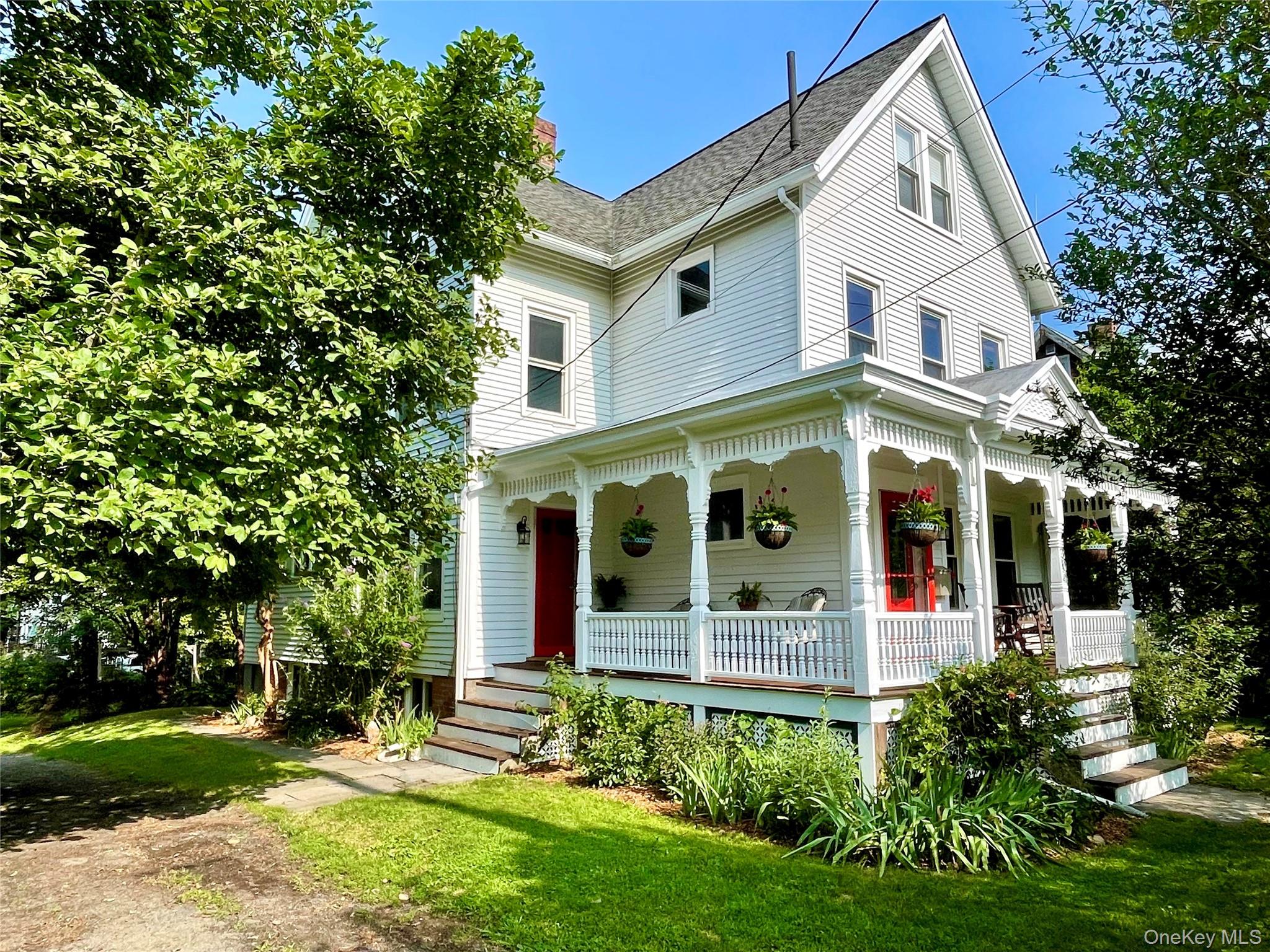 Enchanting, updated Victorian with character on a deep, private double...