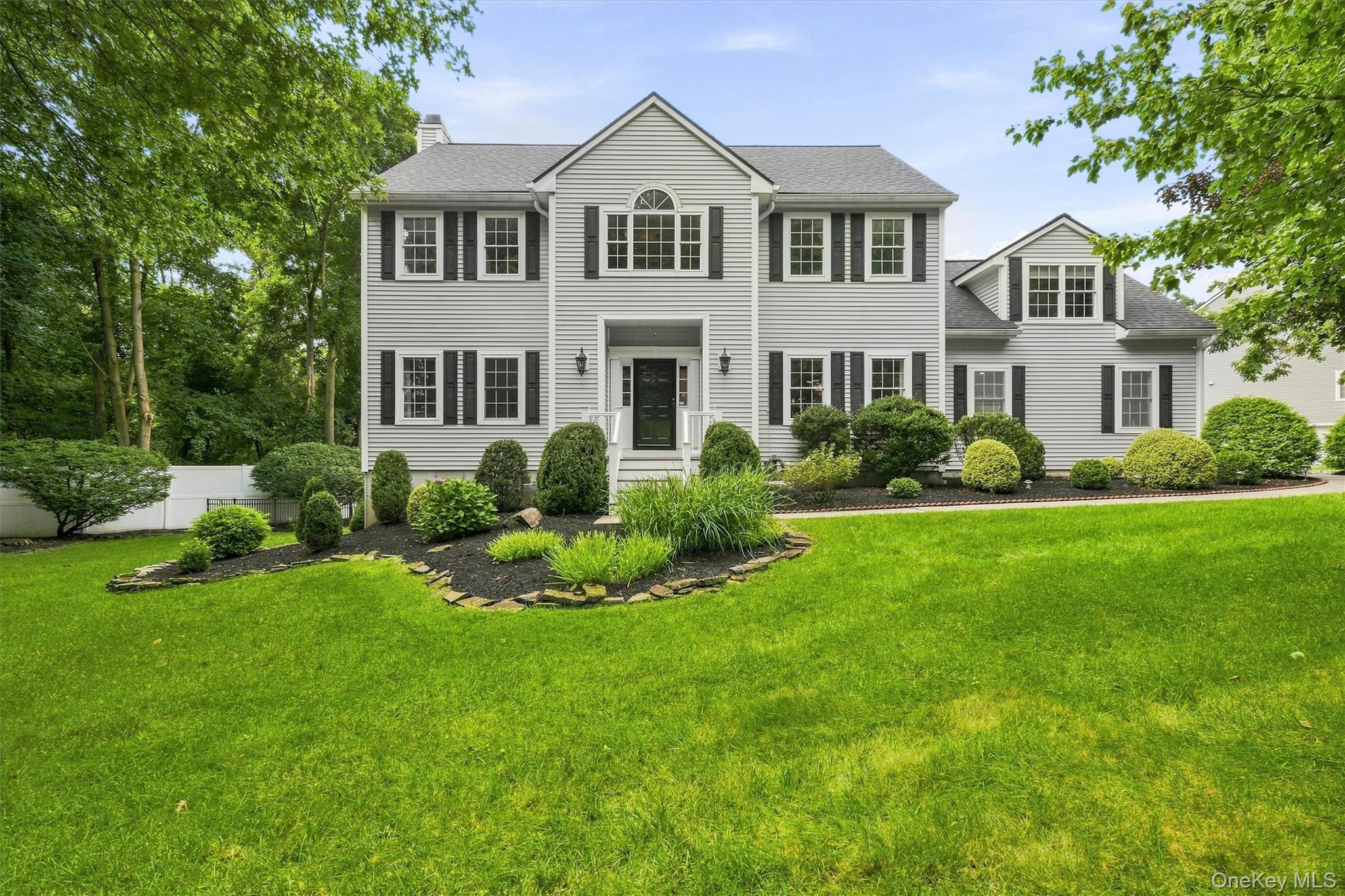 Tucked into a private setting in Croton-on-Hudson, 133 Scenic Drive We...