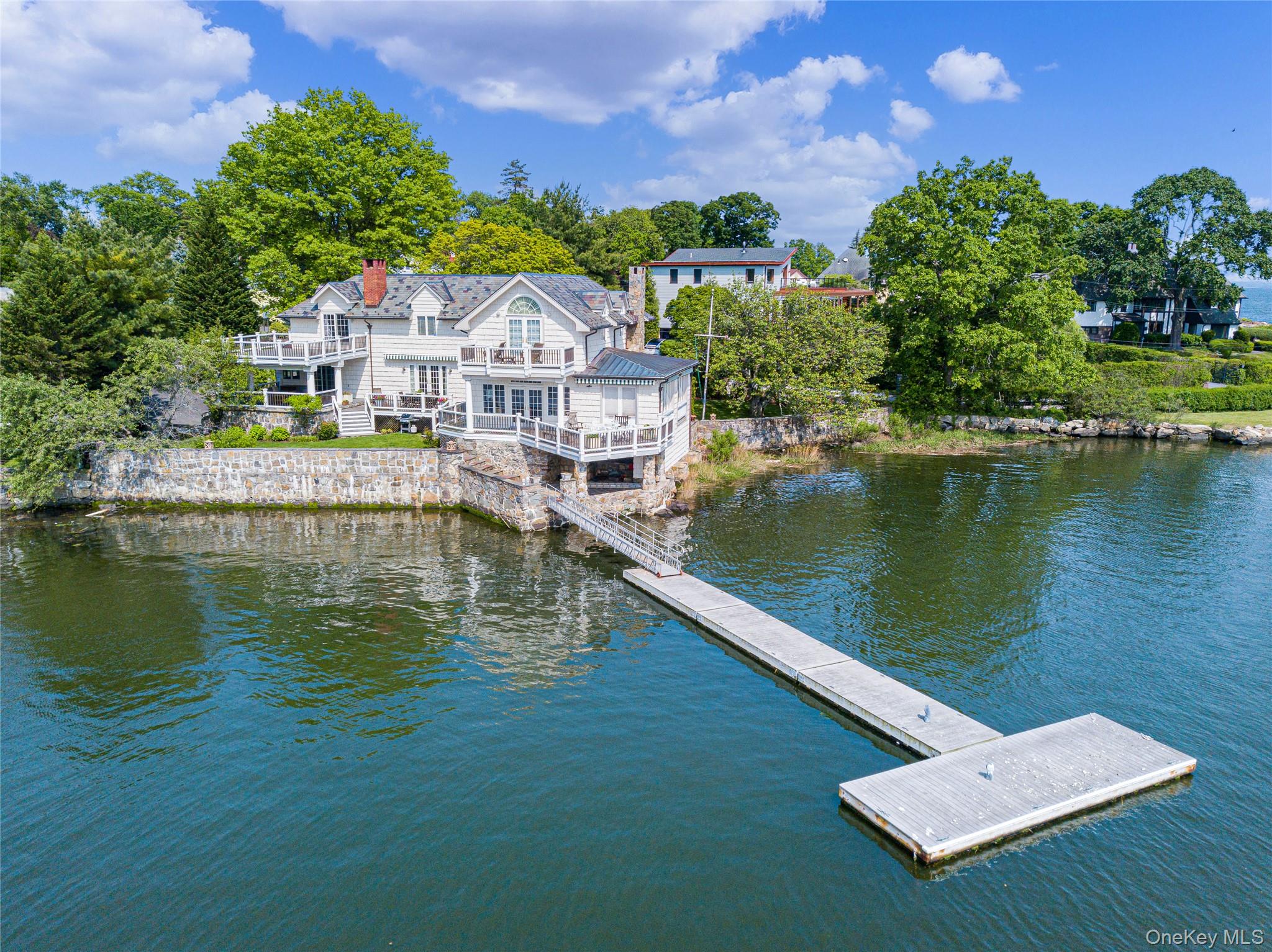 Harbor views abound from this beautifully renovated and impeccably mai...