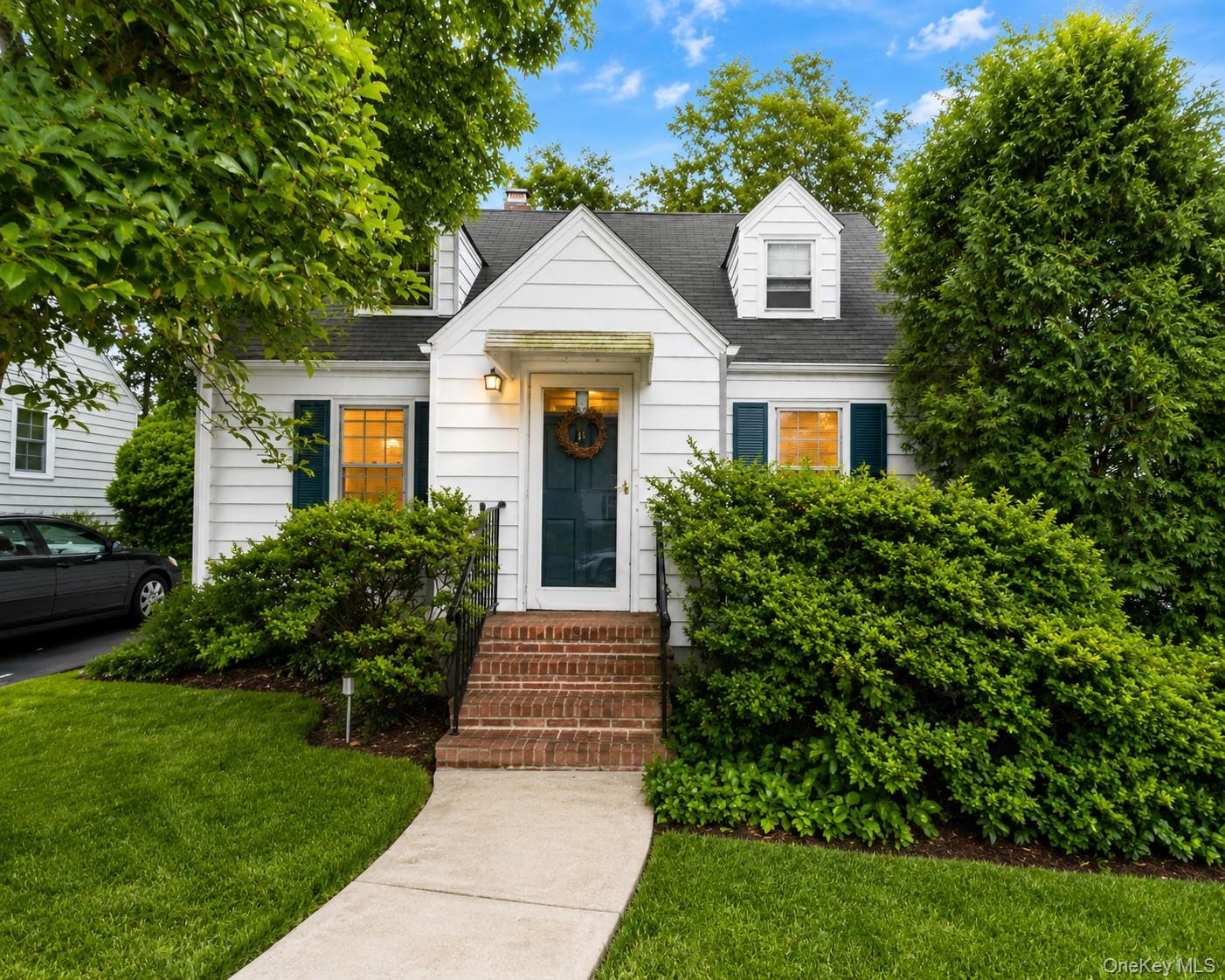 Welcome to this charming 4-bedroom Cape nestled on a peaceful, tree-li...