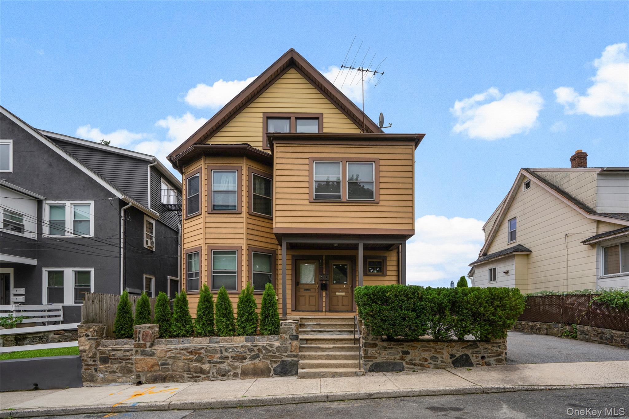 For the first time in 50 years, this well-maintained three-family home...