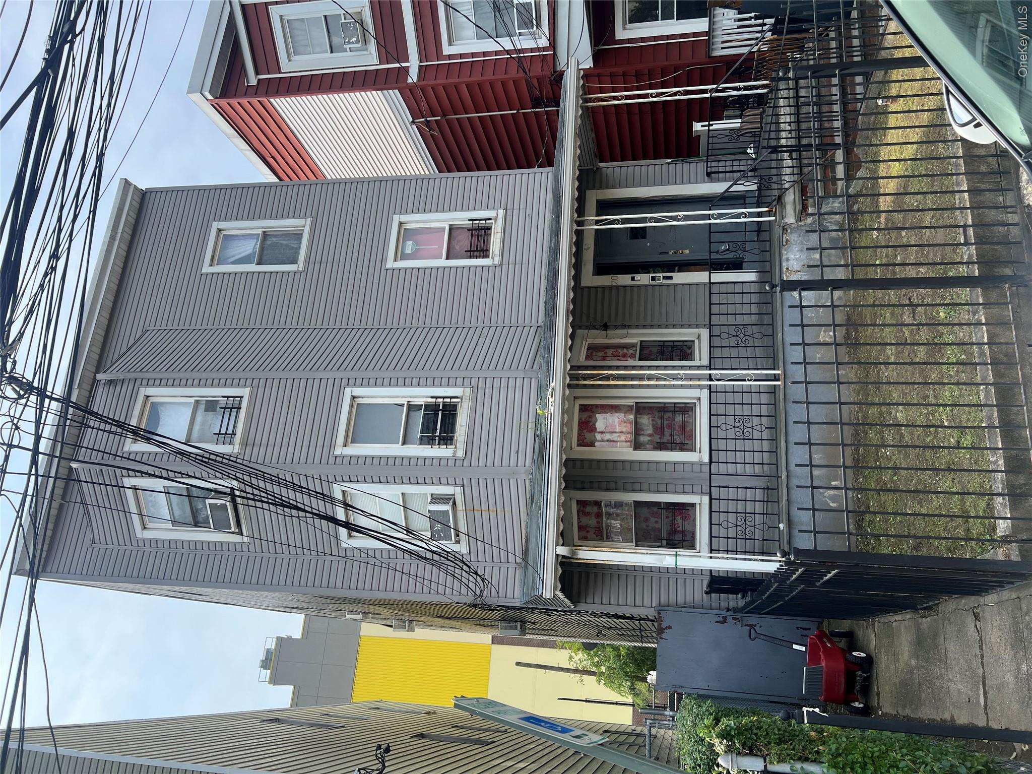 Triplex featuring 3 bedroom units with walk-out basement.