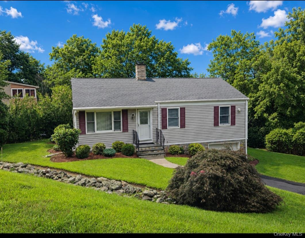 Mid-century ranch-style home nestled on a private lot close to town! A...