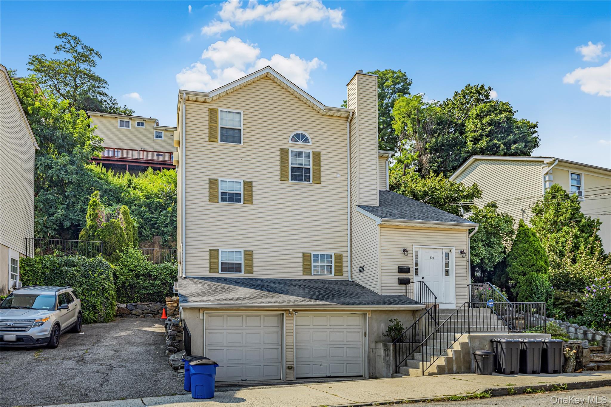 This custom-built, fully updated two-family home offers a rare combina...