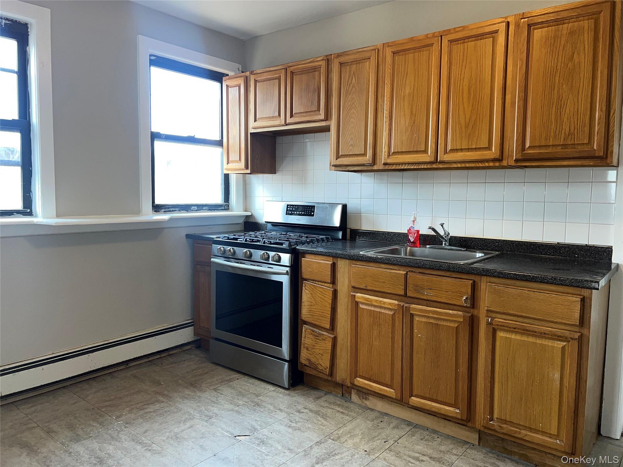 Conveniently located, this bright and sunny top floor three bedroom, o...