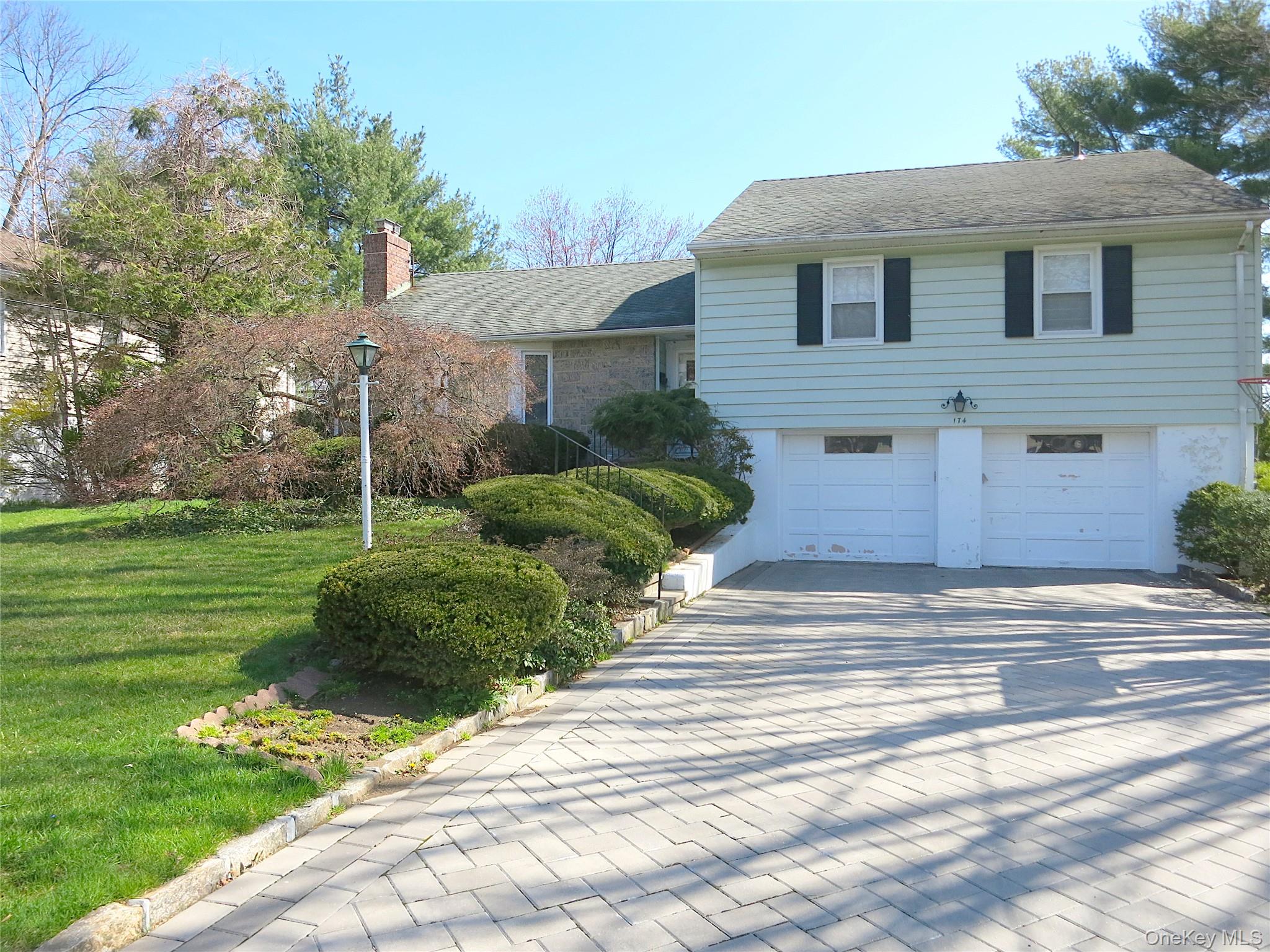 This spacious and well-maintained split-level home is located in the d...