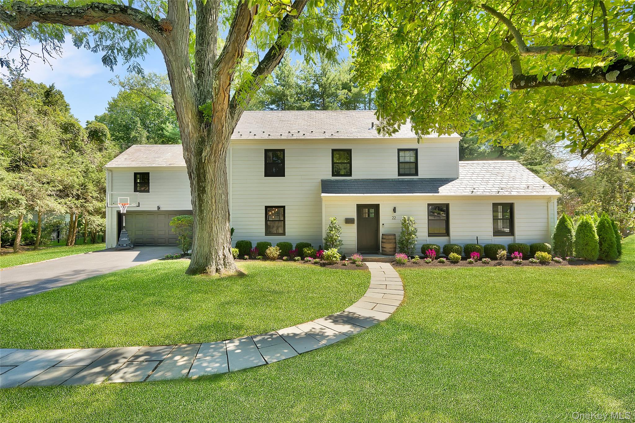 A breathtaking, fully renovated Scarsdale home where modern luxury mee...