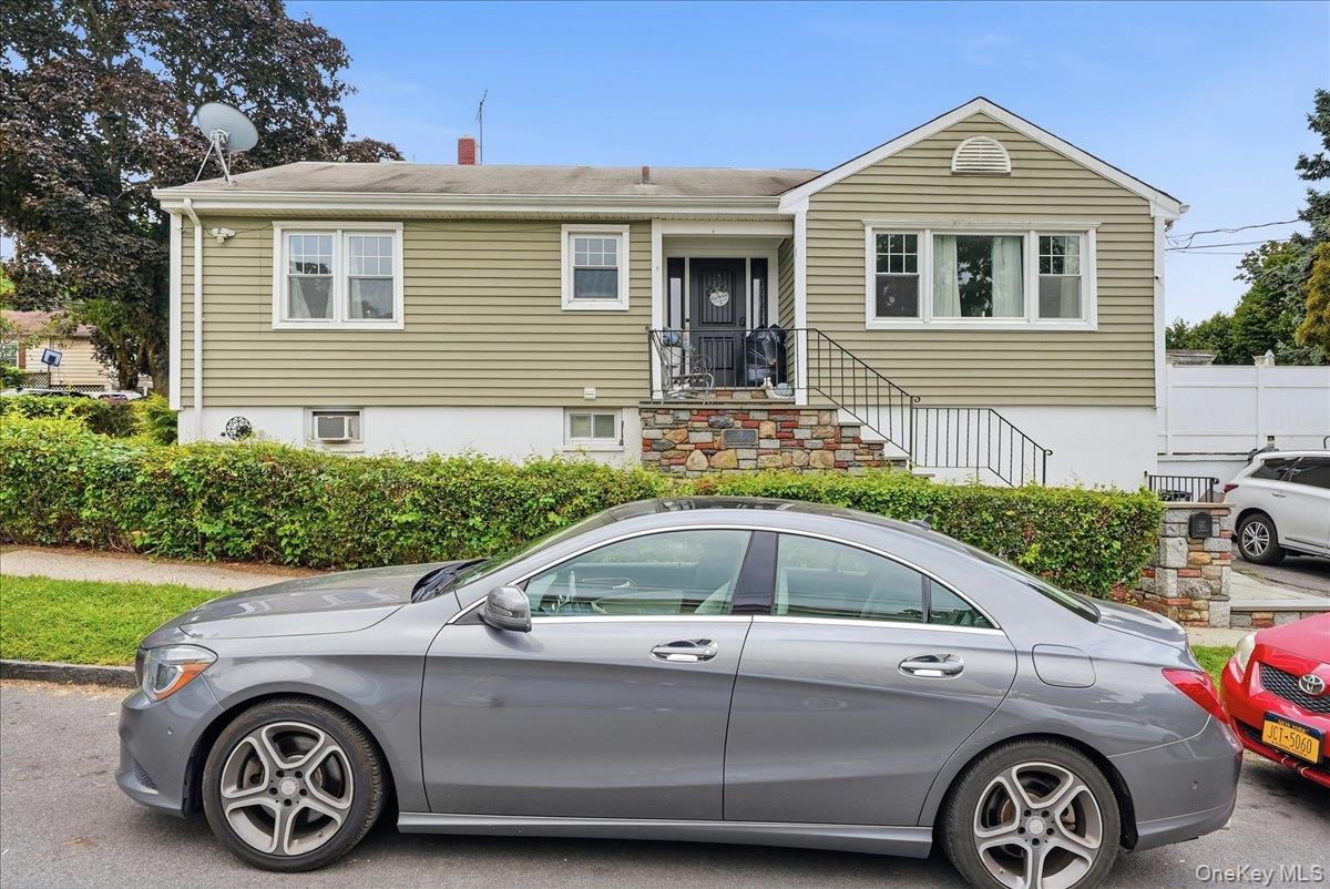 Welcome to this move-in-ready corner-lot Raised Ranch in Northern Yonk...