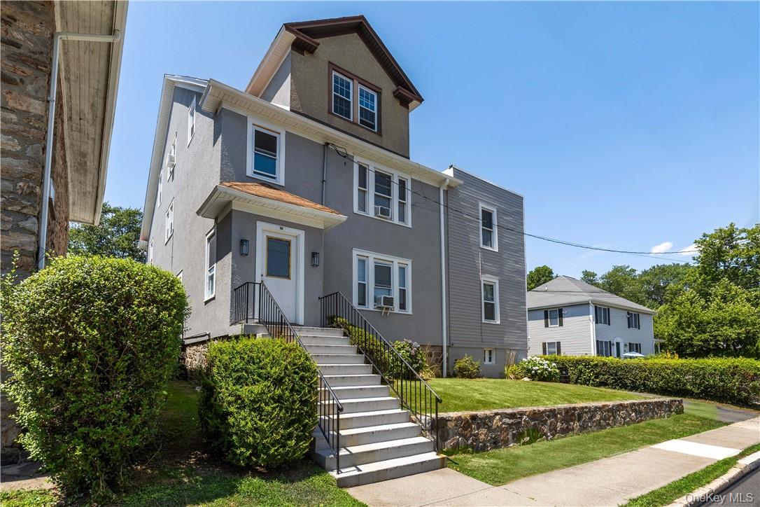 Enjoy living in this spacious, renovated first floor unit within this...