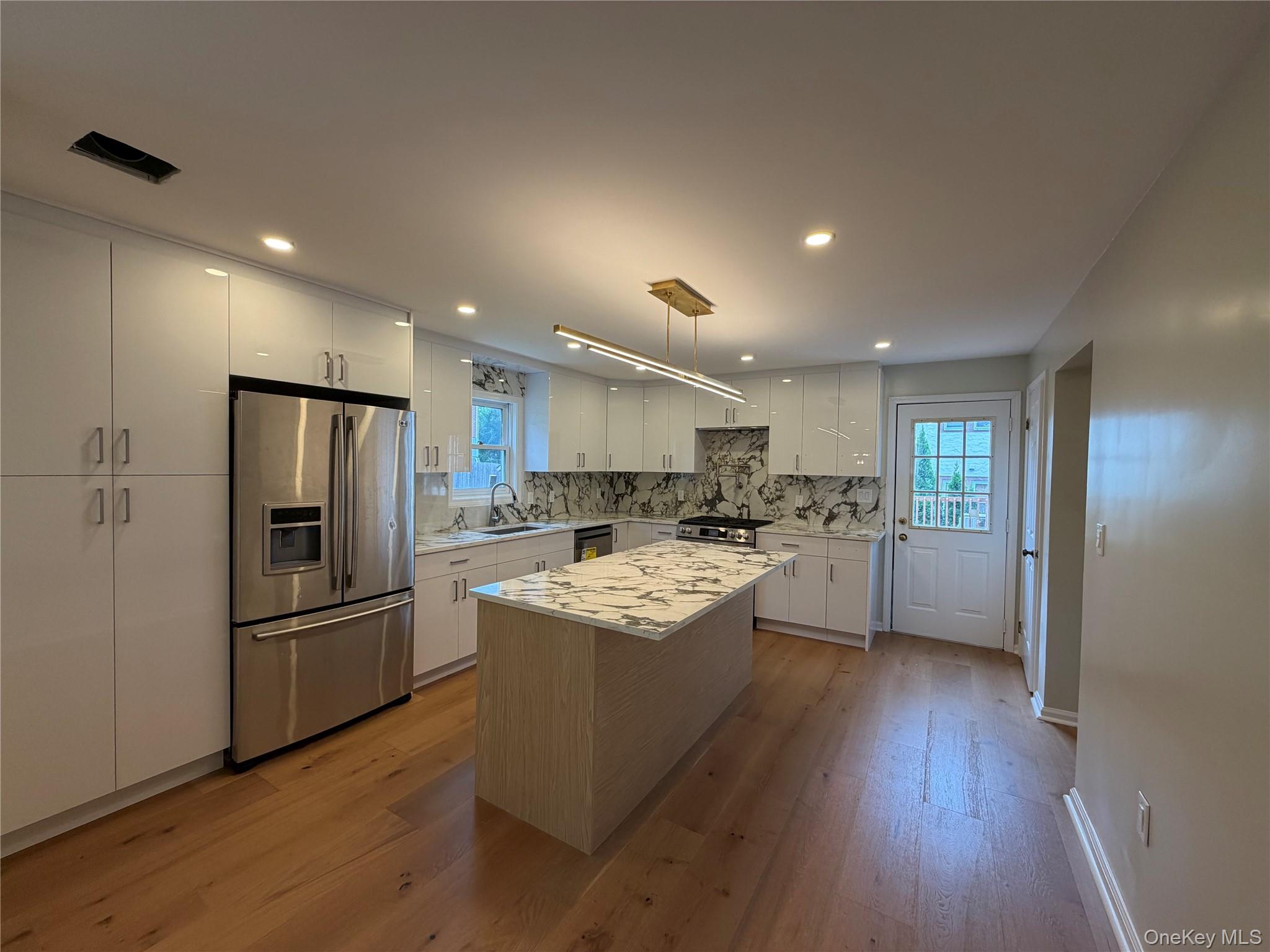 Completely renovated 3BR/2.5BA home offering approximately 2,300 sq. f...