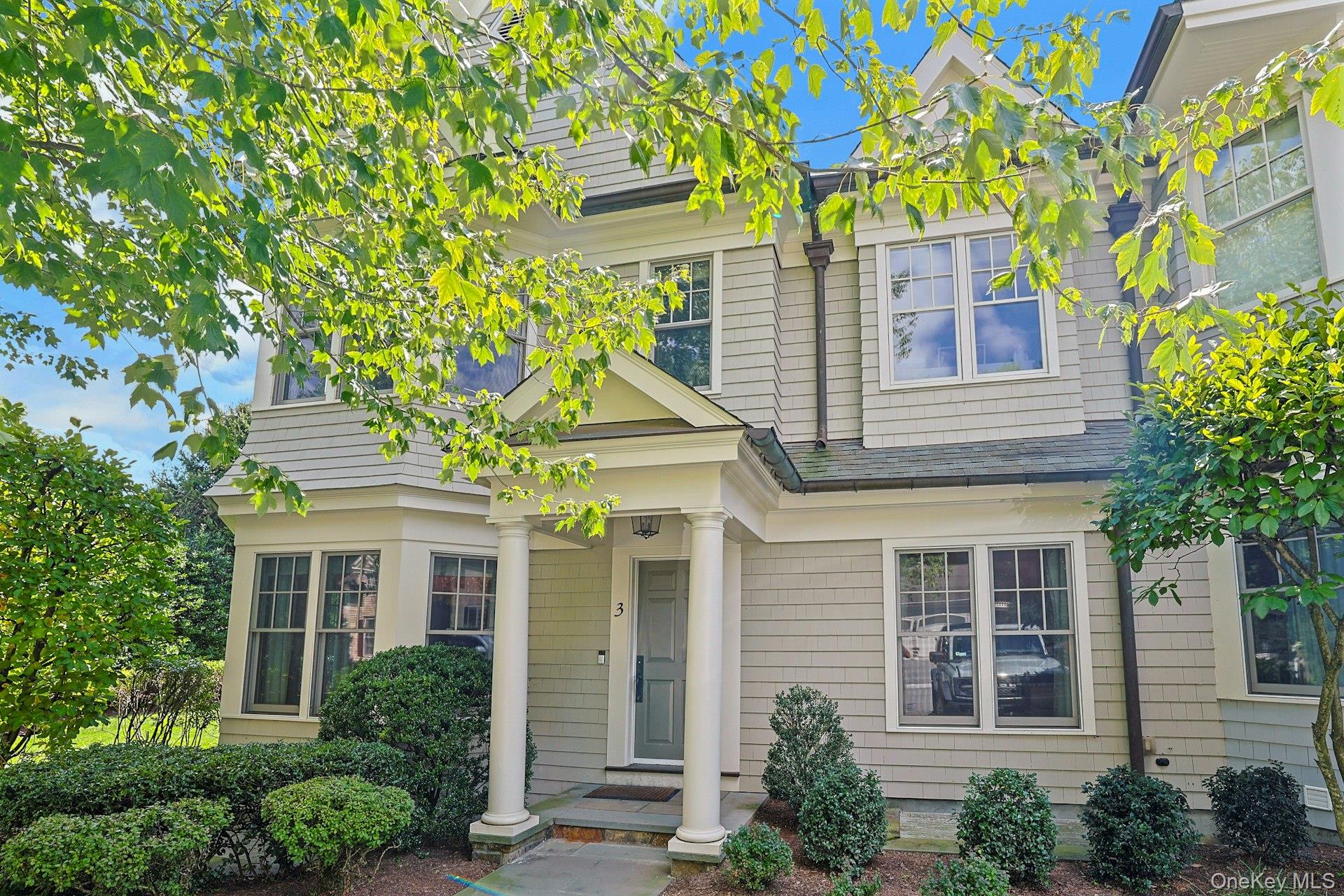 Welcome home to an exceptional end-unit residence offering maintenance...