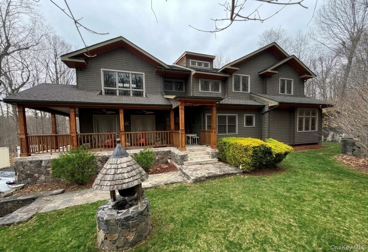 Privately set on nearly 2 acres in sought-after Somers, this stunning...