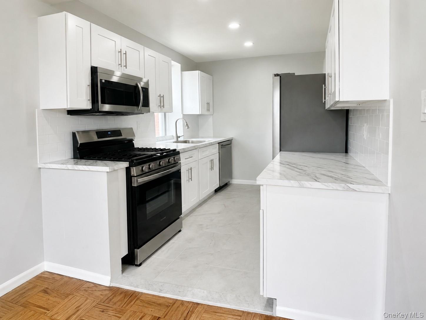Completely renovated from top to bottom and ready to impress! This bea...