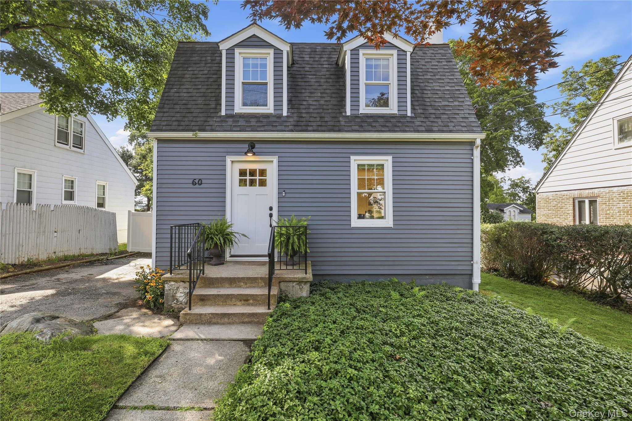 This Mount Kisco charmer is on one of the neighborhood’s most desirabl...