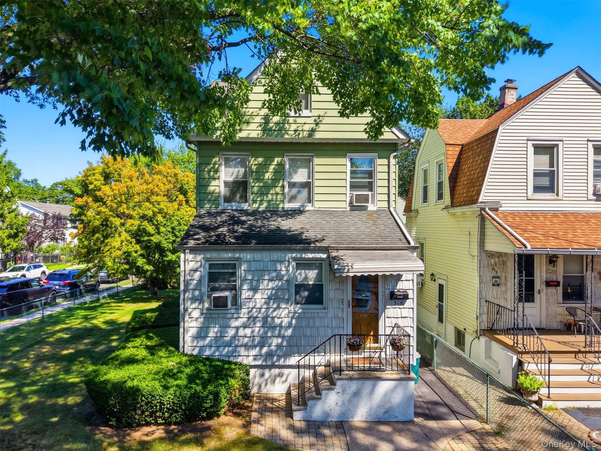 Charming colonial on an exceptional corner Lot. Welcome to this spacio...