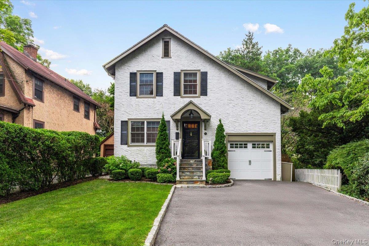 Welcome to 14 Fernwood Avenue, a charming Tudor-style home ideally sit...