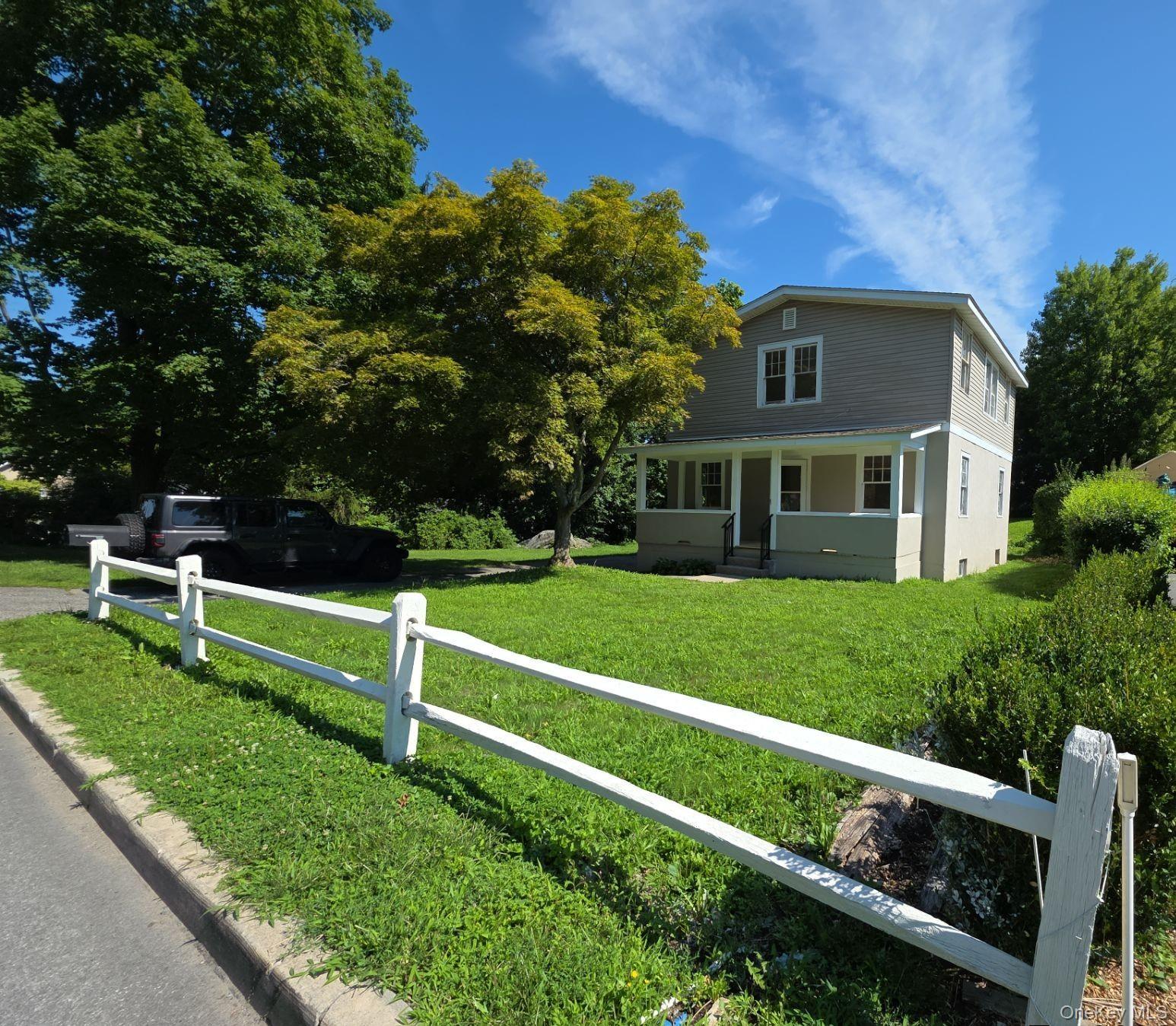 Colonial Style Home. This Home Features 4 Bedrooms, 2 Full Baths, Eat...