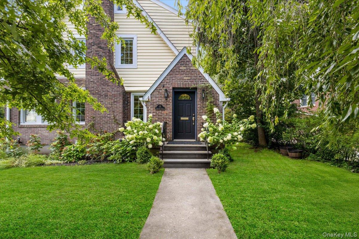 Nestled on a peaceful, tree-lined street, 15 Parkview Court is a light...