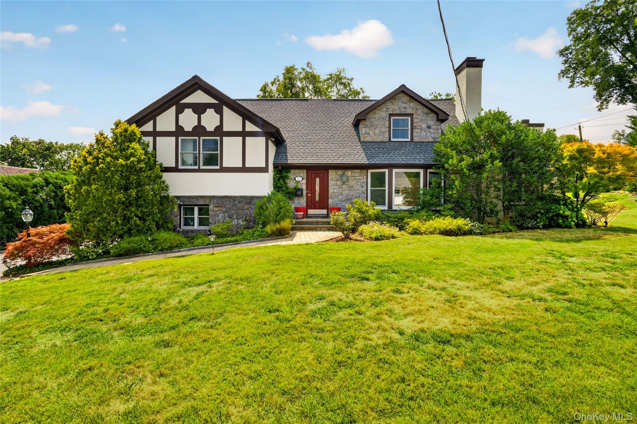 A rare opportunity to own a completely reimagined Tudor in Bronxville,...