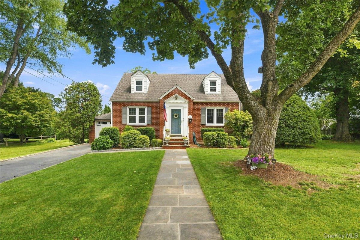 Welcome home to this beautiful 4 bedroom 2 bath Cape Colonial, ideally...