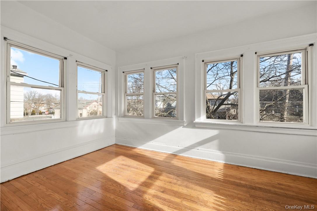 This spacious second-floor walk-up is sun filled, with sparkling hardw...