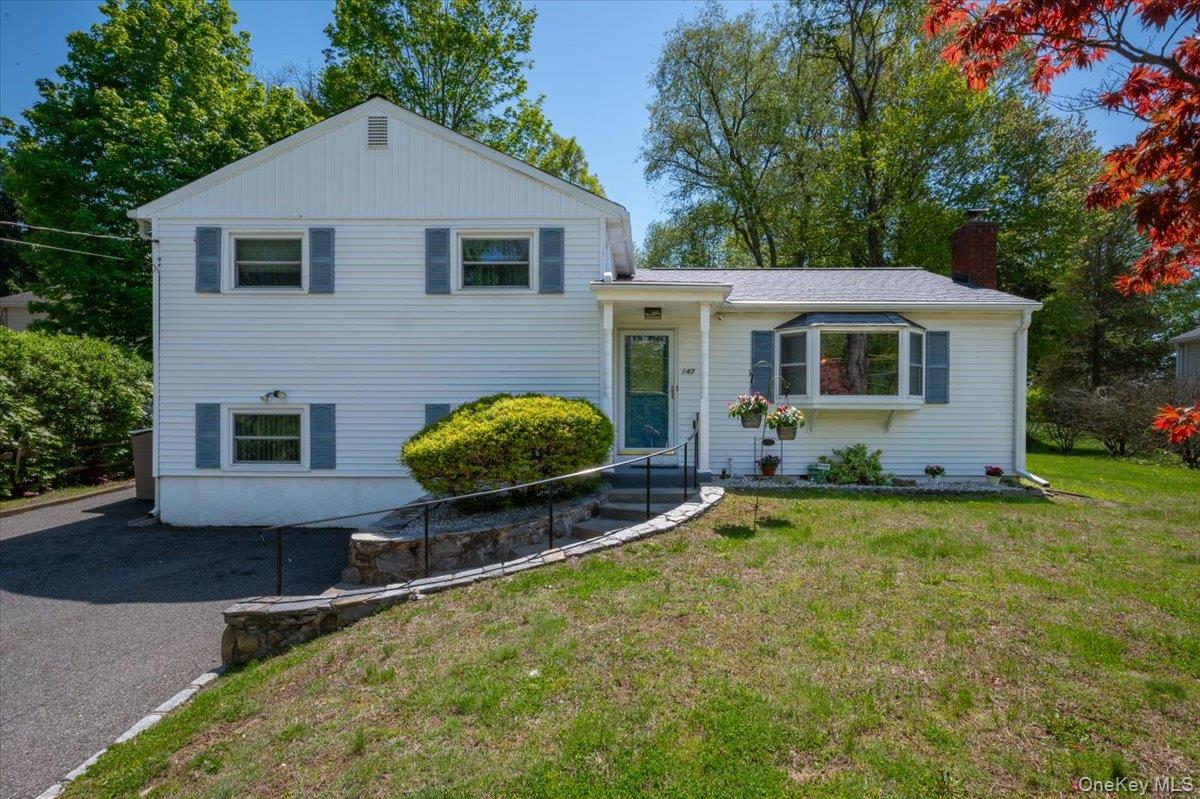 Lovely 3 bedroom/1.5 bath split level home situated on a half acre of...