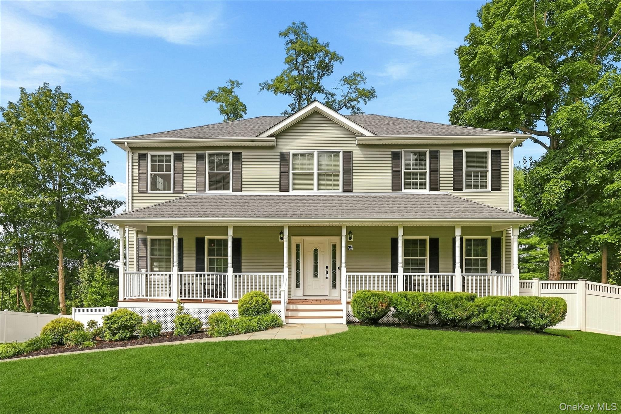 Welcome to 39 E Hill Road, a young Farmhouse Colonial in turn key cond...