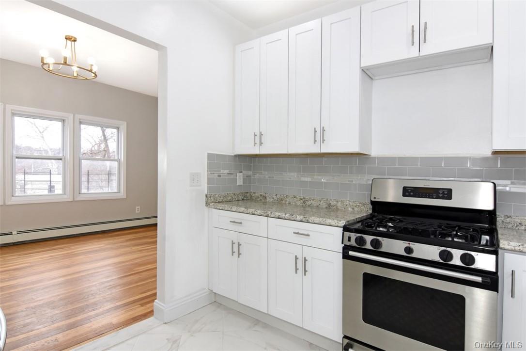 Beautifully renovated 2 Bedroom on first floor with porched. Located r...
