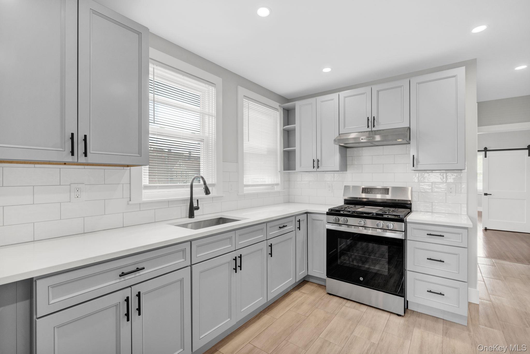 “Completely renovated, sun-filled three-bedroom first-floor apartment...