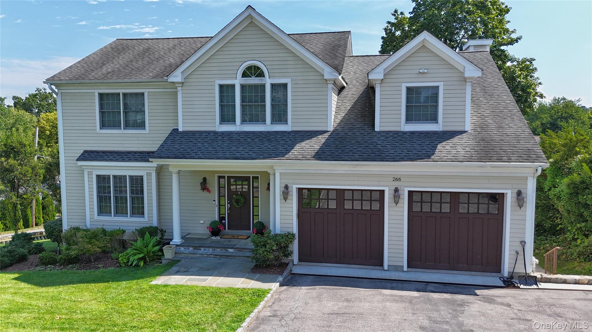 Meticulously maintained, custom-built center hall colonial designed fo...