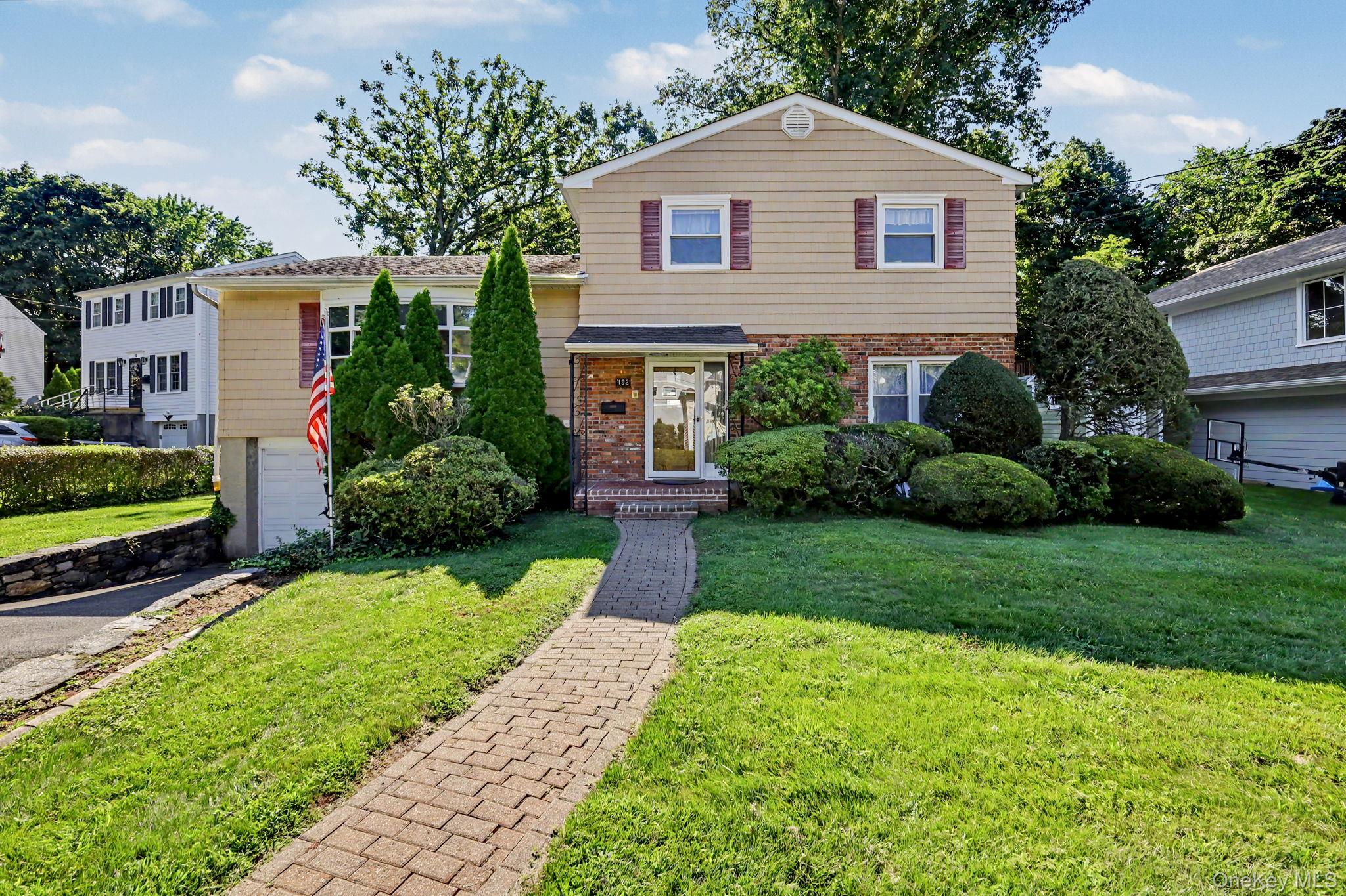 Immaculate and inviting split-level home, ideally situated on a quiet...
