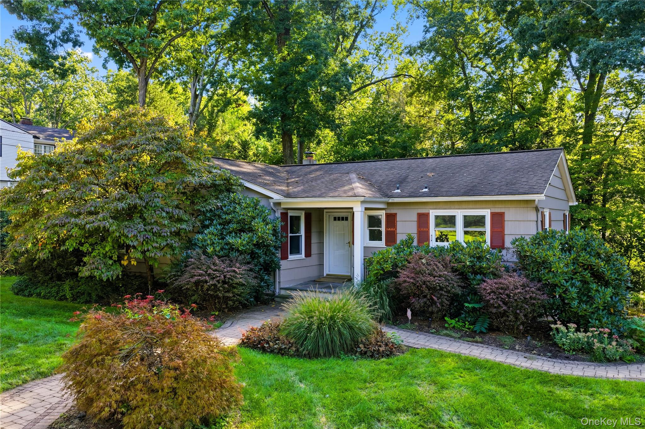 Well-maintained and move-in ready, this charming ranch offers comforta...