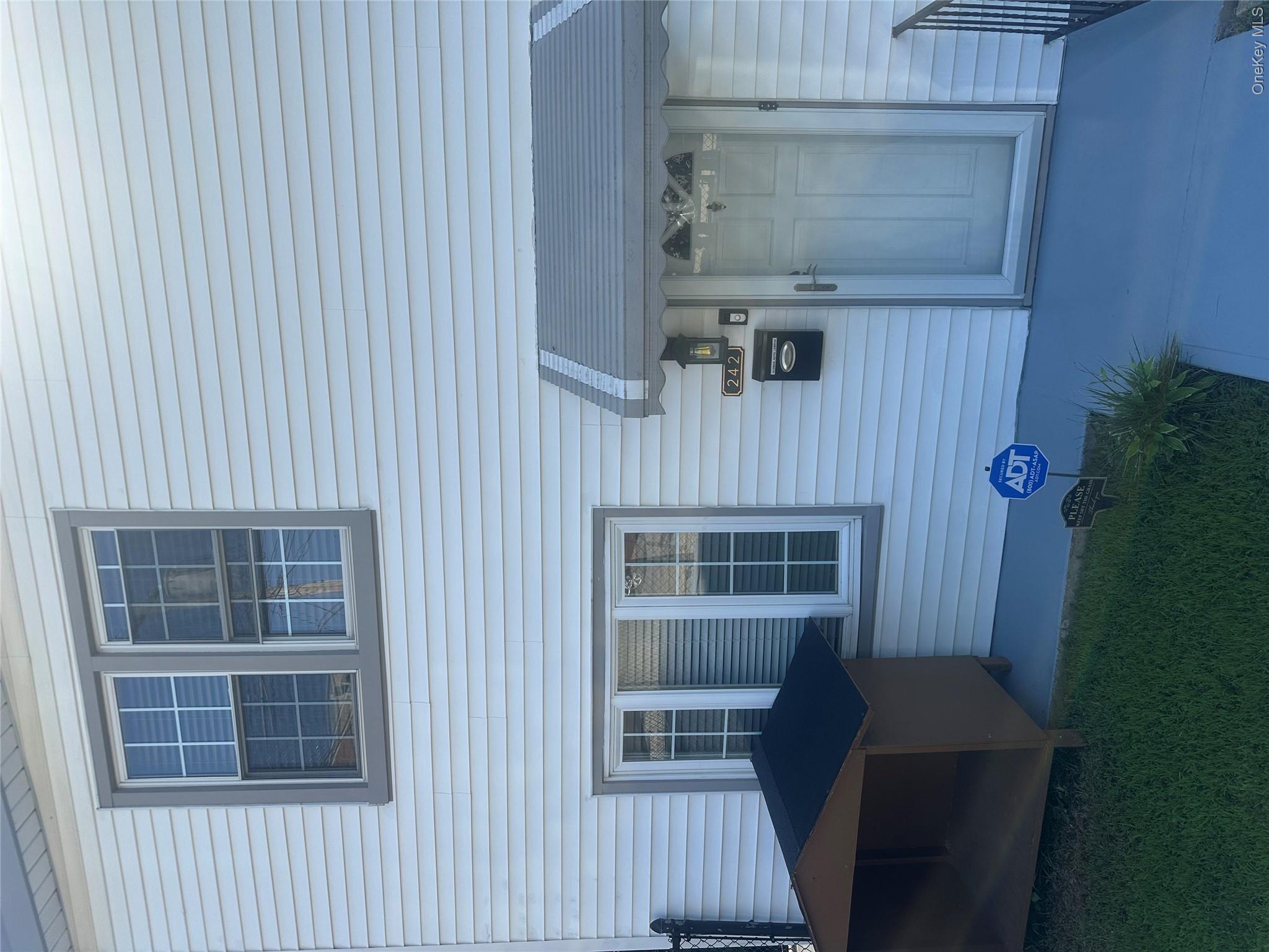 Welcome to 242 Sommerville Place a charming 3 family offering comfort...