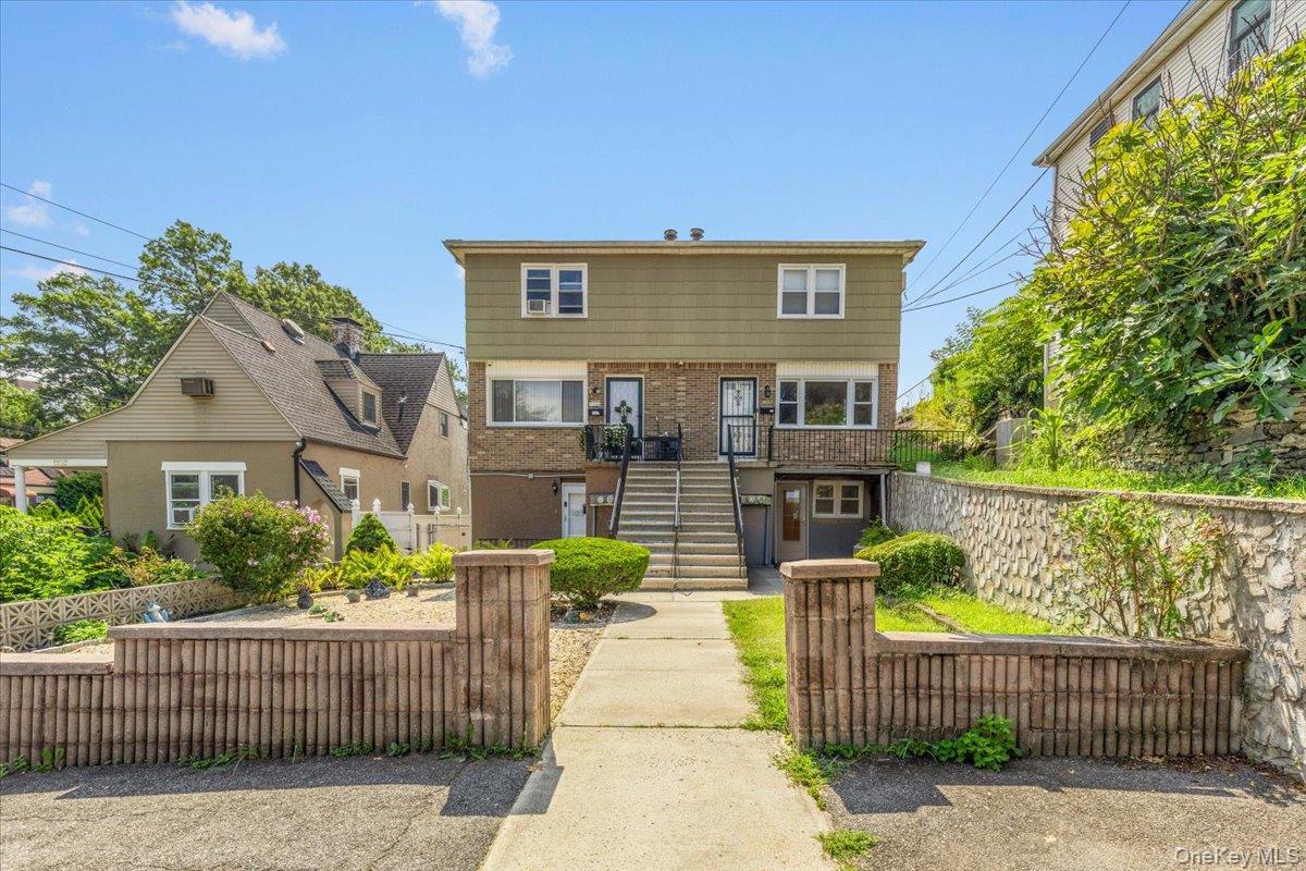 Exceptional Investment Opportunity! This legal attached two-family hom...