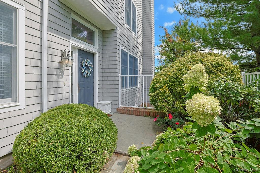 Enjoy this beautifully updated, and stylishly appointed, corner unit h...