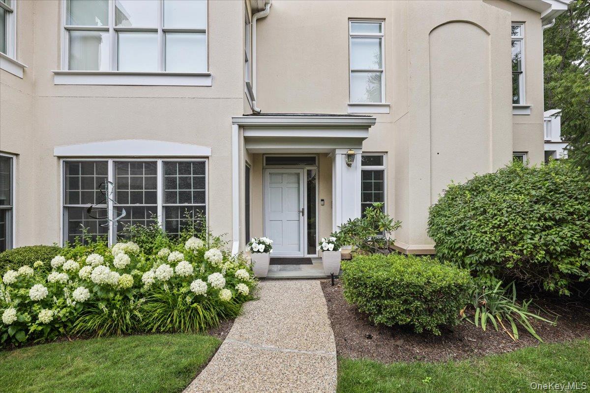 Effortless Living on the Greens — Doral Greens, Rye Brook.

Tucked int...