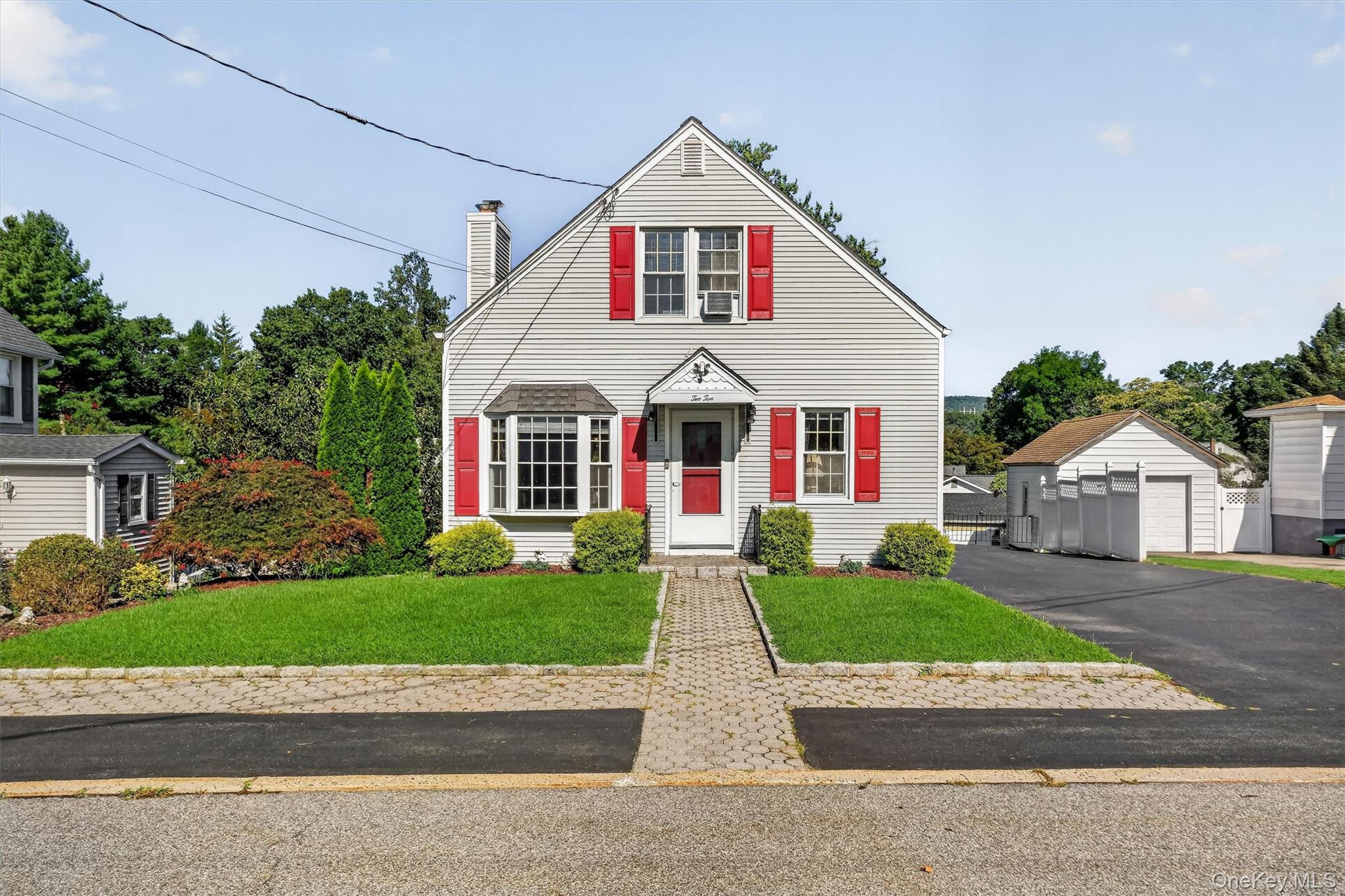 Inviting two bedroom, two bath Cape offering comfortable living, chara...