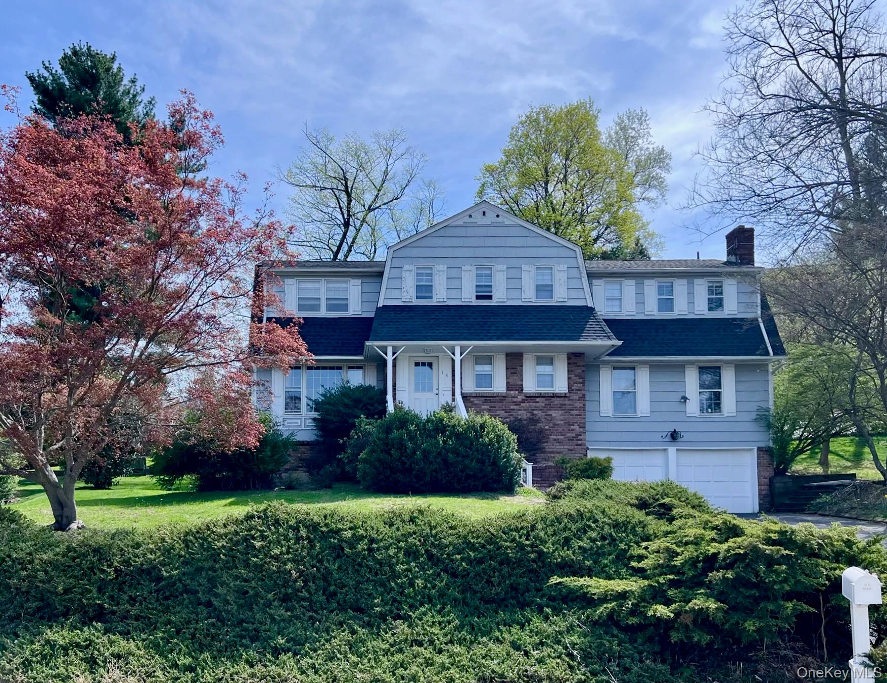 Welcome to 14 Powder Horn Way, a classic Colonial residence offering a...