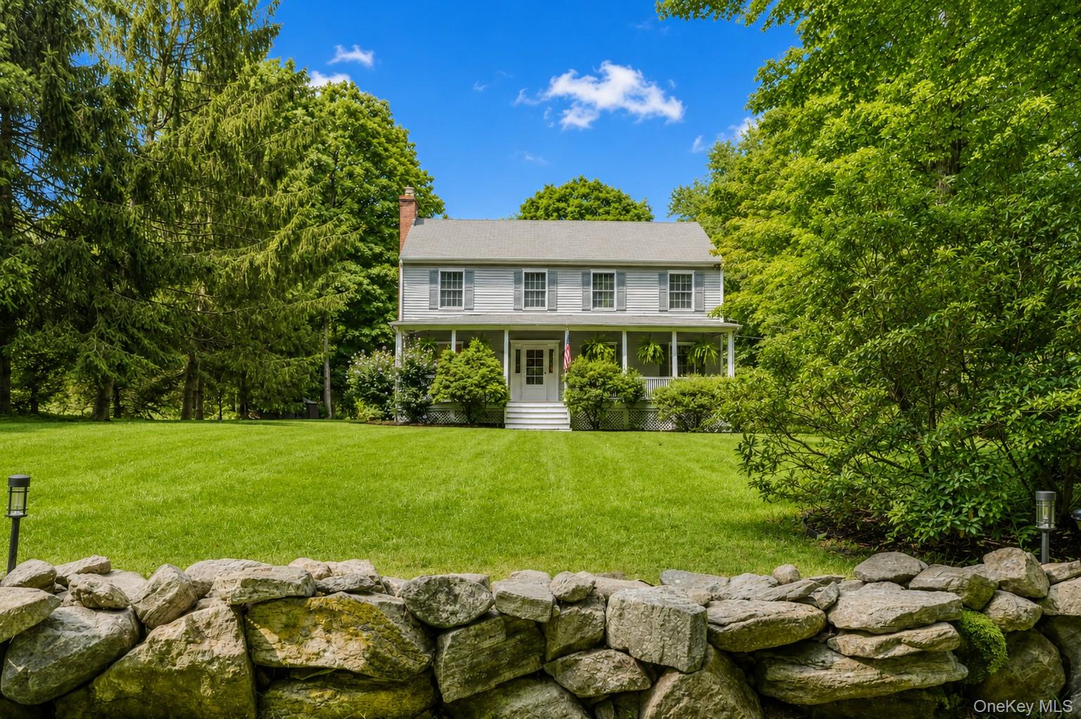 Set along a quiet dirt country lane in the heart of North Salem’s reno...