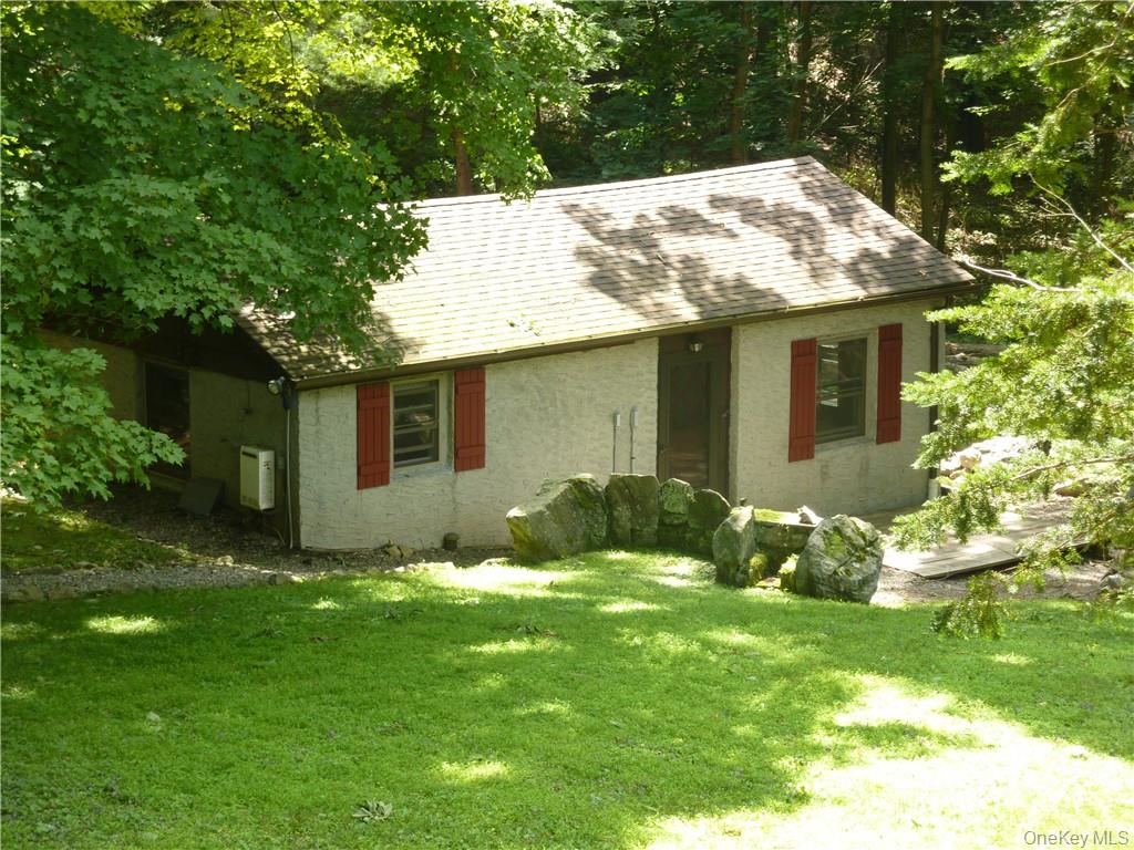Charming studio cottage offers comfortable open layout with plenty of...