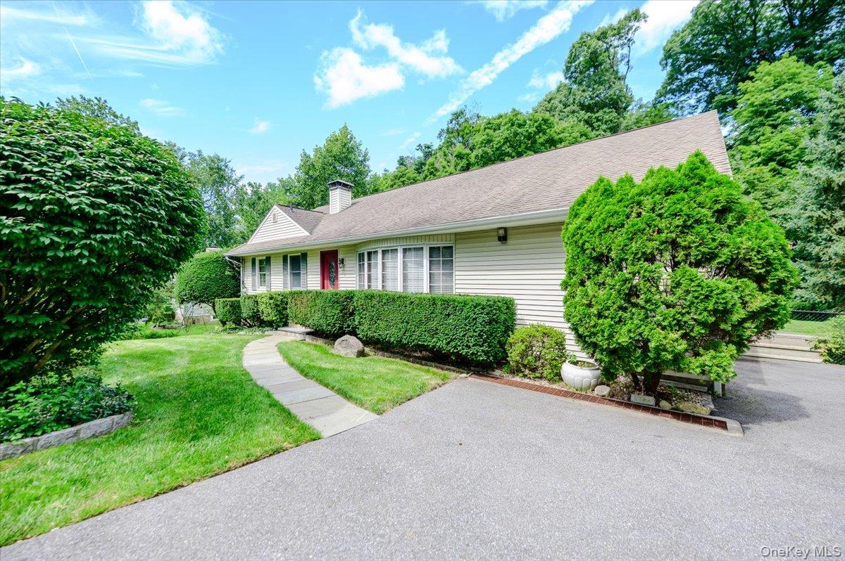 Welcome to 9 Somerstown Road, nestled in a sought-after Ossining neigh...