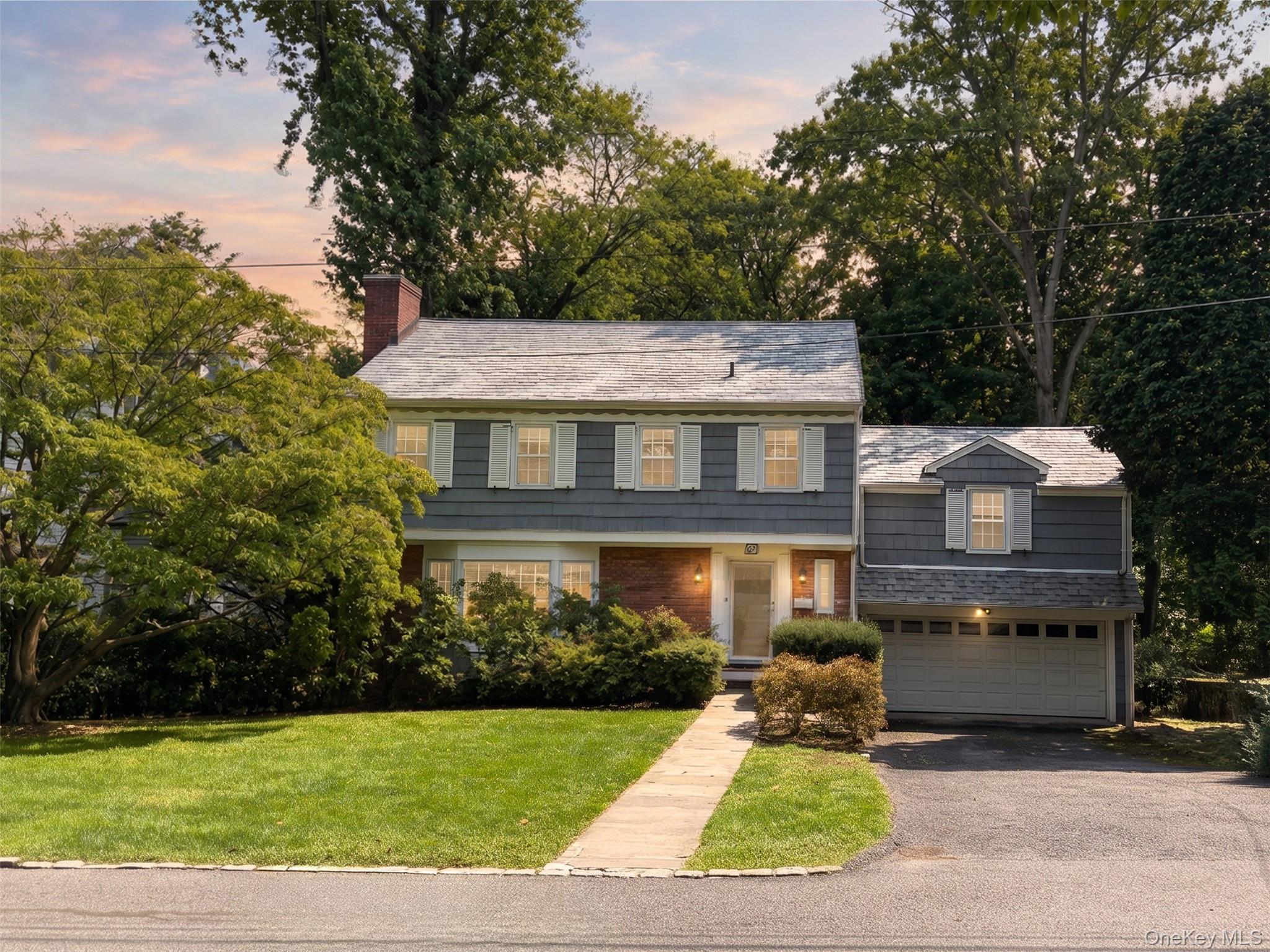 Welcome to this beautifully maintained Colonial in Scarsdale’s highly...